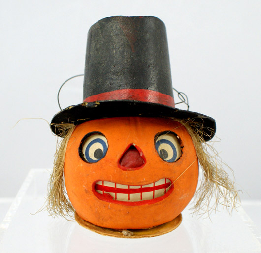 Halloween candy container jack-o-lantern with top hat. Image courtesy of William H. Bunch.